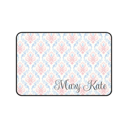 Decorative mat with floral pattern and 'Mary Kate' text on a white background