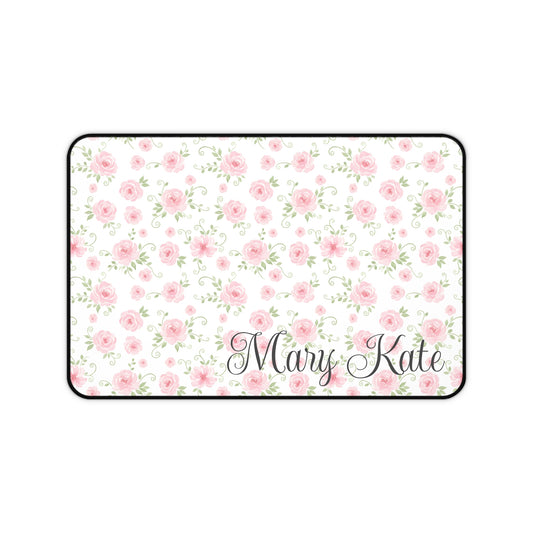 Floral patterned mat with 'Mary Kate' text on a white background