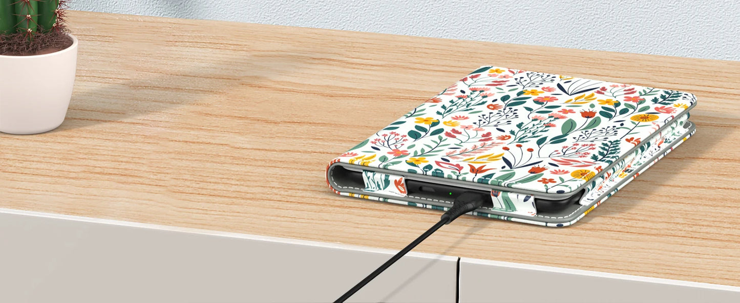 Floral patterned electronic device on a wooden surface
