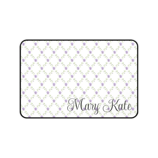 Patterned mat with 'Mary Kate' text on a white background