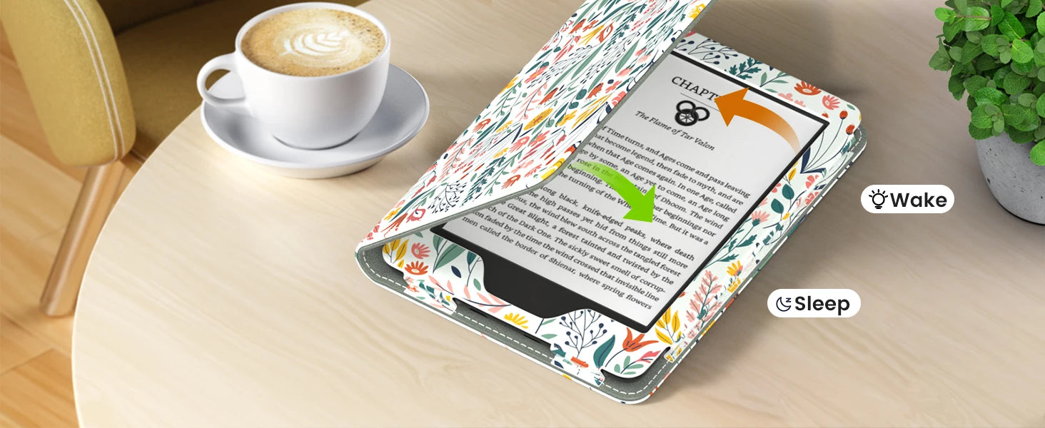 Tablet with a colorful case on a wooden table next to a cup of coffee and a plant.