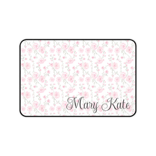 Floral patterned mat with 'Mary Kate' text on a white background
